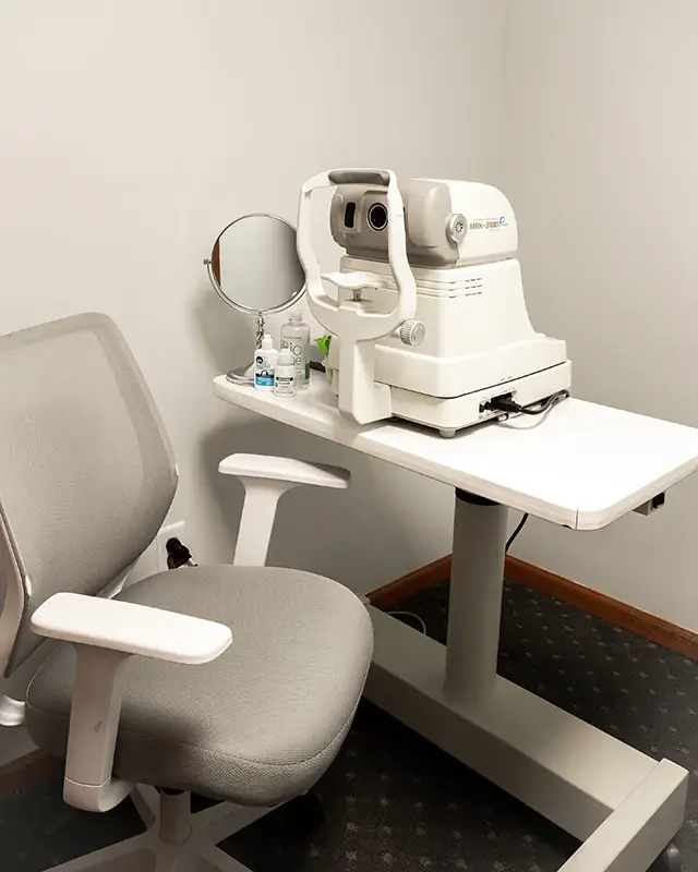 Eye exam room medical equipment Advanced Eyecare & Contact Lens Center, St. Charles