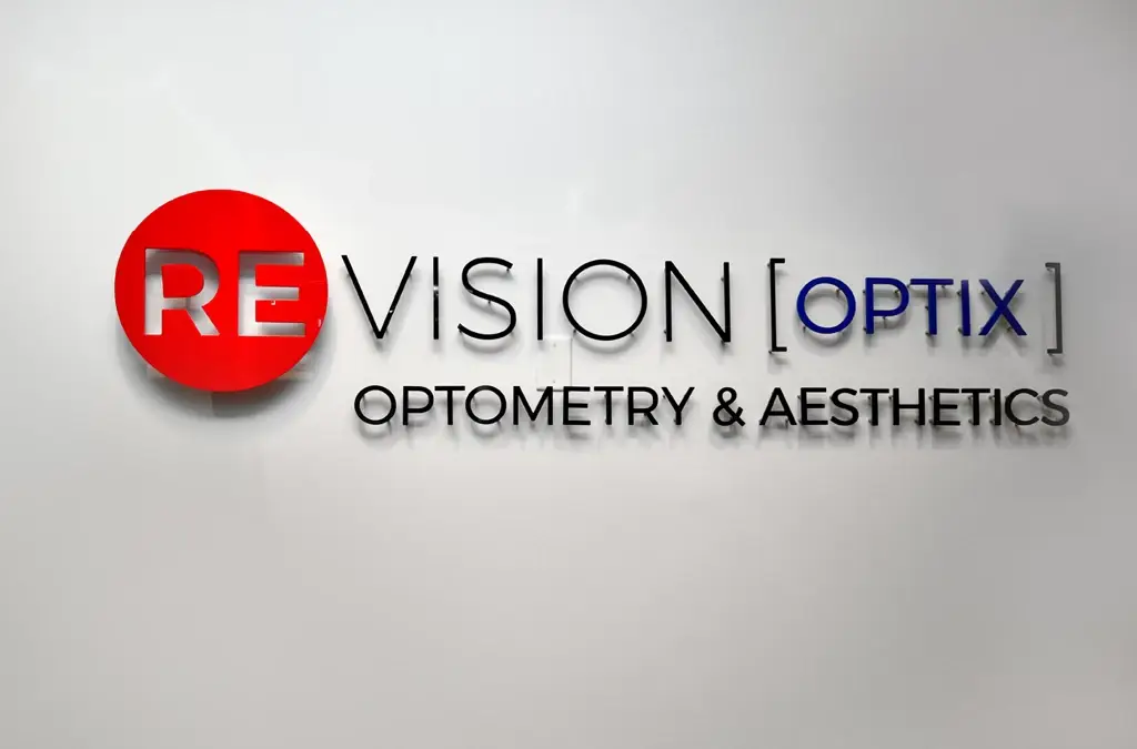 Wall logo inside Revision Optix in Greenville