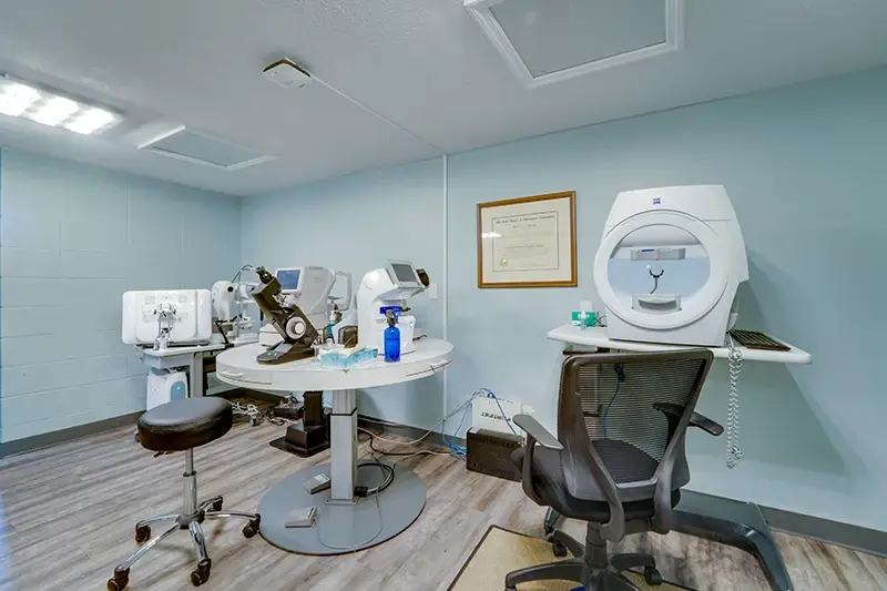 Aloma Eye Associates exam room with high tech eye equipment.