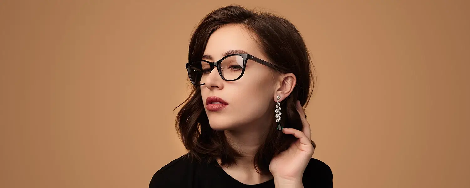 Confident young woman wearing eyeglasses