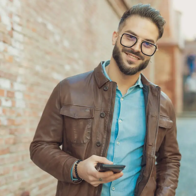 Young man wearing stylish glasses.