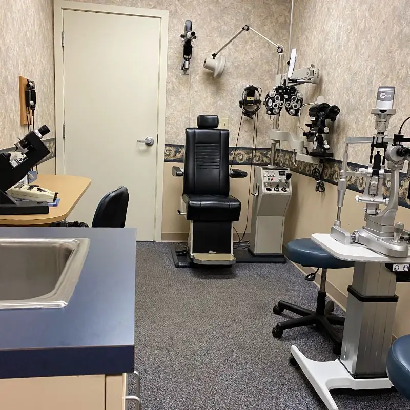 Exam room with medical equipment at Shawnee Optical Springfield.