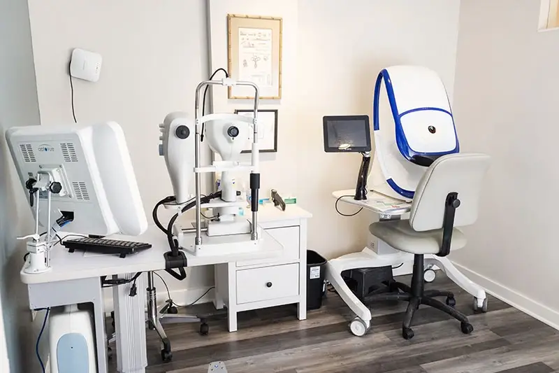 Eye exam room with eye exam medical equipment at Evanston Eye Wellness in Evanston IL.