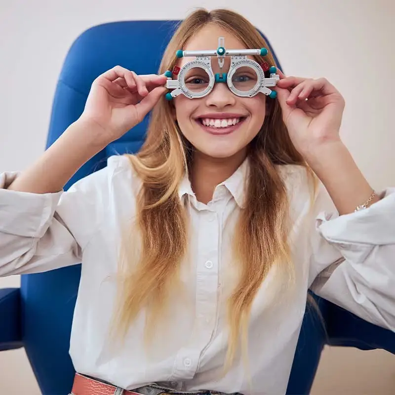 Happy female with trial lenses.