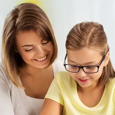 Mother and daughter reading together.