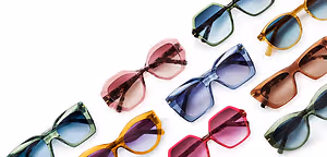 A collection of colorful sunglasses with different frames and lens colors displayed on a white background.