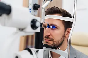 Man getting an eye exam at an optometrist's office