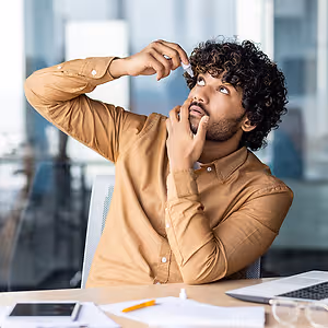 business-man-adjusting-glasses