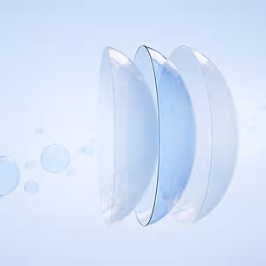 Three contact lenses floating in water