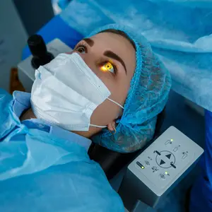 woman with yellow eye reflections in a hospital room