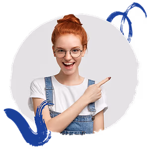 A woman wearing glasses and a white shirt with denim overalls is pointing at the camera and smiling