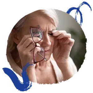 Older woman adjusting her glasses