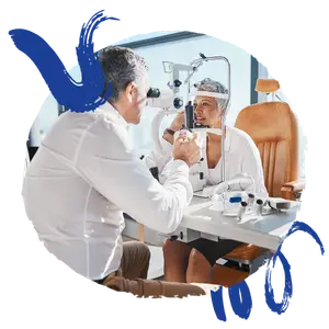 Doctor examining the eyes of a patient with an ophthalmoscope