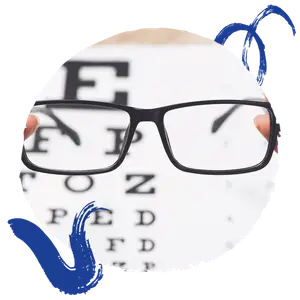 An eye doctor's office with an eye chart and an exam lense.