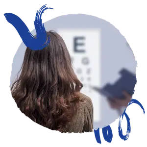 Woman with brown hair looking at an eye chart