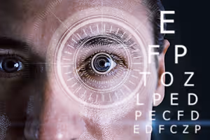 A close-up image of a person's eye with a circle of light in the center and a black background with white text
