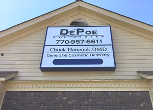 Sign outside of DePoe Eye Center and Chuck Hancock DMD