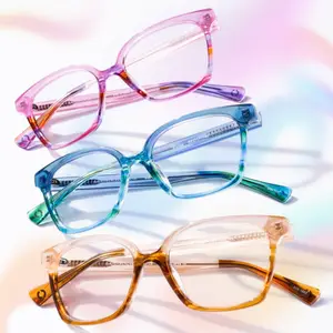 Four pairs of glasses of different colors are on a white background.