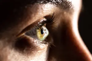 Close up of a woman's eye looking to the left