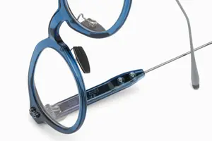 Blue-framed glasses with adjustable nose pads on a white background