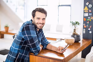 young man wearing contact lenses at work
