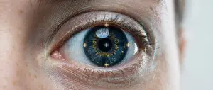Close up of an eye with a crosshair overlay