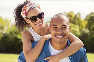 happy couple enjoying the outdoors