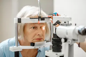 Senior woman having an eye test with a doctor