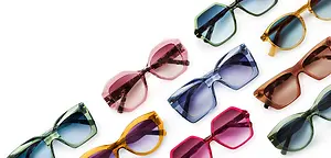 A collection of sunglasses with different colored lenses and frames arranged on a white background