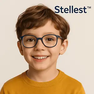 A smiling young boy wearing glasses and a yellow sweater with the word Stellest in blue text above him