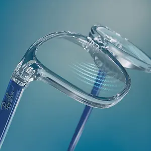 A close-up view of a pair of clear glasses with blue frames and lenses against a blue background.