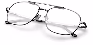 Close-up of a pair of black-framed glasses with clear lenses on a white background