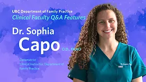 A woman smiling for a photo wearing a teal green shirt with a name tag on it that says Dr. Sophia Capo.