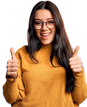 A woman with long black hair wearing glasses and a yellow sweater is smiling and giving two thumbs up.