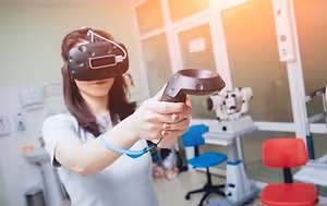 A woman using a virtual reality headset in a medical room