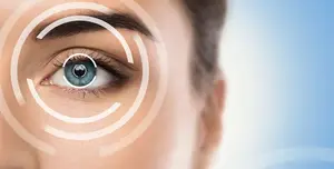 Close-up of a woman's eye with a focus on the iris and pupil, set against a blue and white background