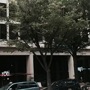 Rohi and npt restaurants with cars parked outside