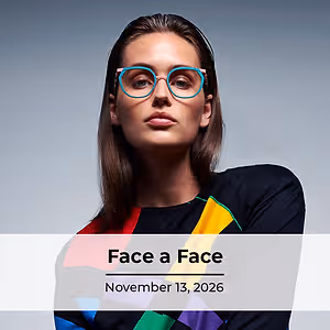 Woman wearing colorful glasses and a colorful top with the words Face a Face and the date November 13, 2026 written on it