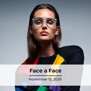 Woman wearing colorful glasses and a colorful top with the words Face a Face and the date November 13, 2026 written on it