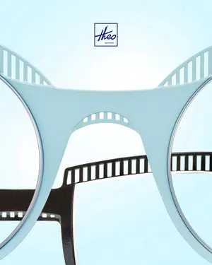 Blue Theo eyewear glasses with a black film strip design on a blue background