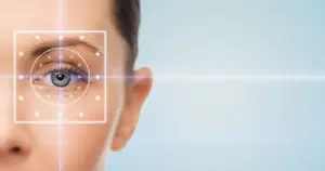 Woman's face with a circle around her eye and white dots inside the circle