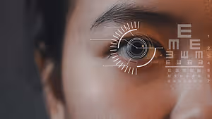 Close up of an eye with an eye chart and a scanning icon in the corner