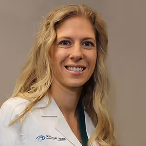 Dr. Emily E. Smith smiling for a professional headshot