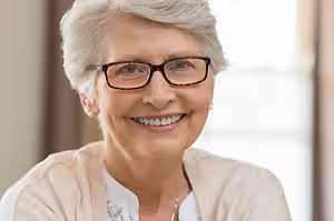 Portrait of a smiling senior woman wearing glasses