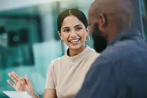 Doctor and patient discussing treatments for Meibomian Gland Dysfunction