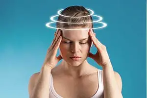 a woman with her head in her hands
