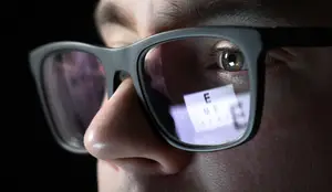 eye chart in glasses lens