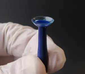 scleral contact lens on blue applicator 