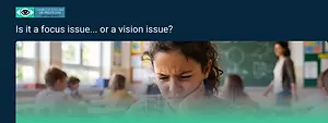 Is it a focus issue... or a vision issue? - A woman with a pained expression in a classroom