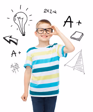 A smiling boy wearing glasses and a striped shirt stands with his hands on his head, looking up at a white wall with educational drawings including a light bulb, math equations, a book, and a triangle.
